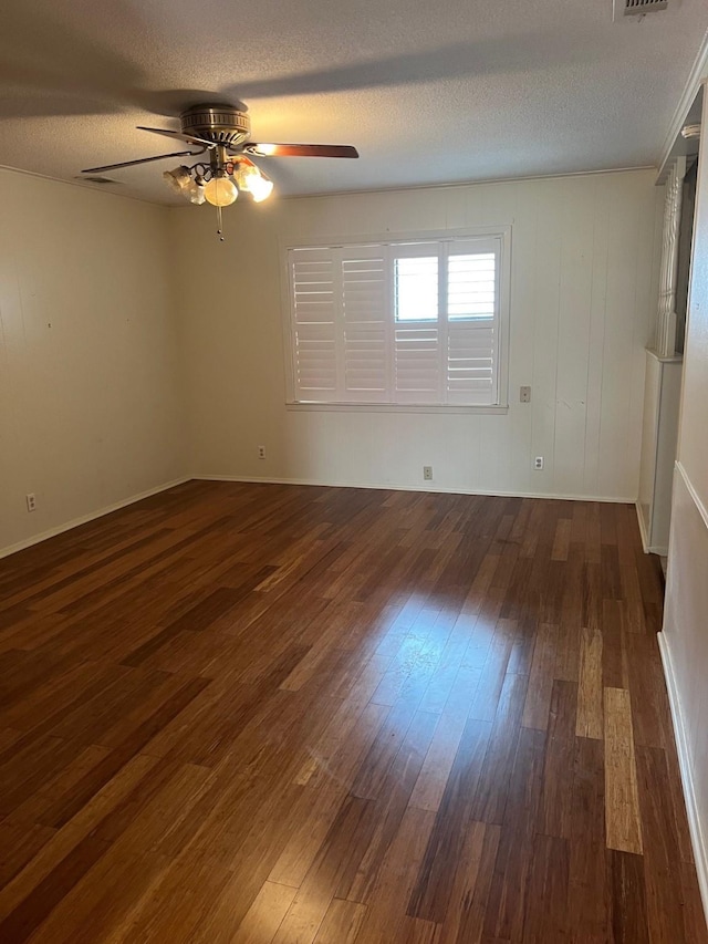 800 Humphrey St, Athens, TX 75751 - empty room featuring a ceiling fan, hardwood / wood-style floors, a textured ceiling, and visible vents