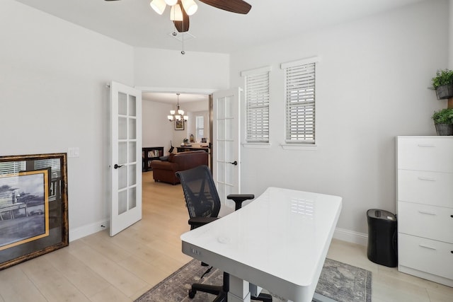 1103 Wrenwood Dr, Justin, TX 76247 - home office with french doors, light wood-style flooring, ceiling fan, a chandelier, and baseboards