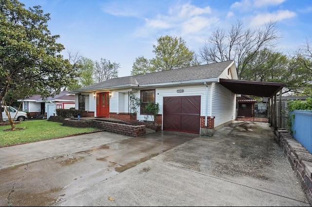 7220 Amy St, Dallas, TX 75217 - ranch-style house with fence, a front yard, an attached carport, brick siding, and driveway