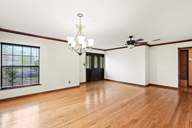 7220 Amy St, Dallas, TX 75217 - empty room featuring light wood-style floors, ornamental molding, and a healthy amount of sunlight