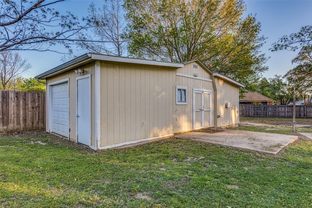 view of outbuilding featuring an outbuilding and a fenced backyard