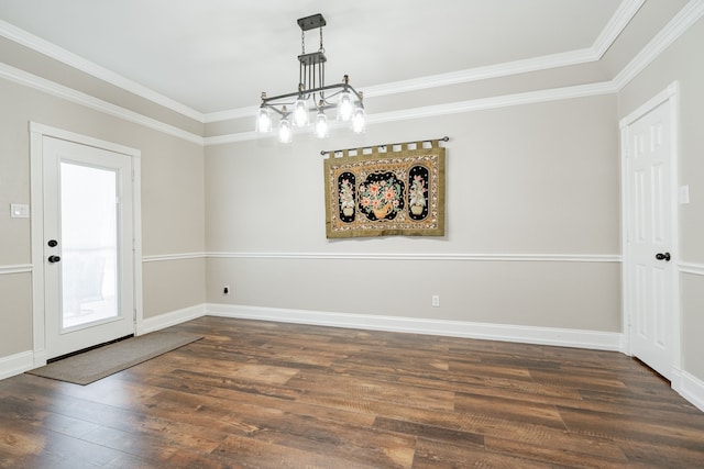 1609 W Alamosa Dr, Talty, TX 75160 - unfurnished dining area featuring dark wood finished floors, ornamental molding, a chandelier, and baseboards