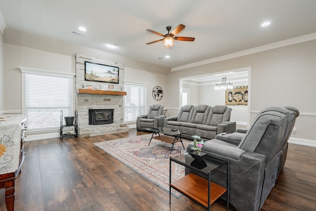 1609 W Alamosa Dr, Talty, TX 75160 - living room featuring a ceiling fan, a fireplace, dark wood-style floors, ornamental molding, and a chandelier
