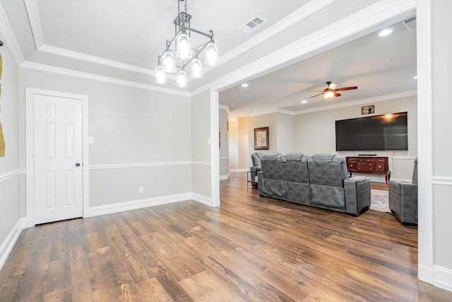 1609 W Alamosa Dr, Talty, TX 75160 - living room with dark wood-style floors, a ceiling fan, ornamental molding, recessed lighting, and a chandelier