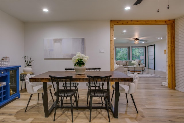 dining area with light wood-style floors, ceiling fan, and recessed lighting
