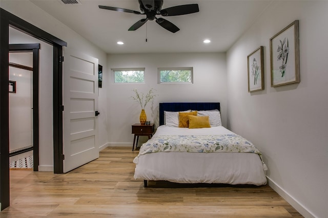 bedroom featuring baseboards, ceiling fan, light wood-style flooring, and recessed lighting