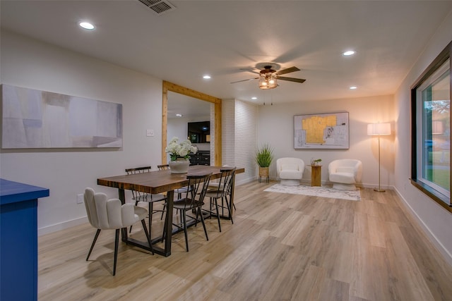 dining space featuring visible vents, light wood-style floors, ceiling fan, and recessed lighting