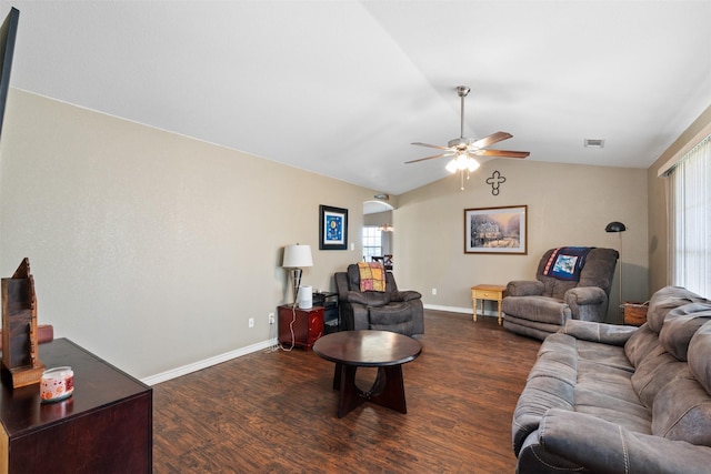 living room featuring wood finished floors, a healthy amount of sunlight, ceiling fan, and visible vents
