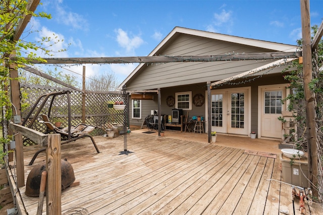 wooden terrace featuring french doors