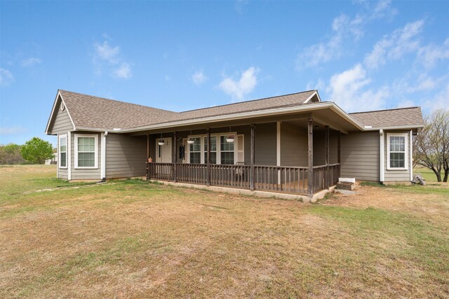 1493 County Road 3555, Paradise, TX 76073 - single story home with a front lawn and a shingled roof