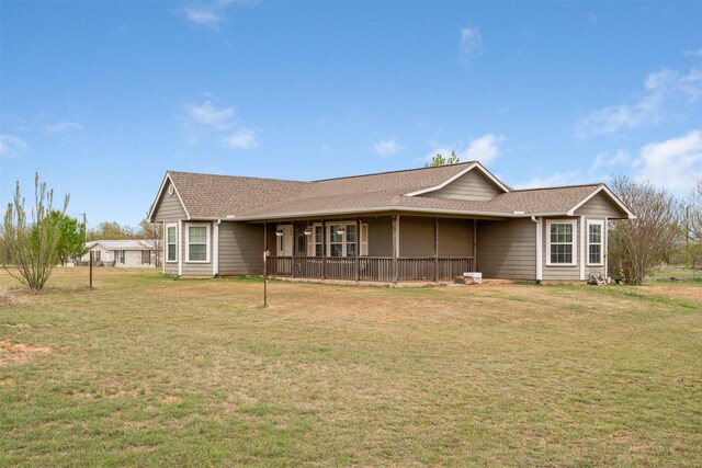 1493 County Road 3555, Paradise, TX 76073 - view of front of property with a front yard and roof with shingles