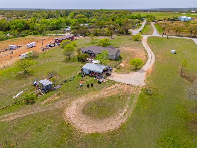 birds eye view of property featuring a rural view