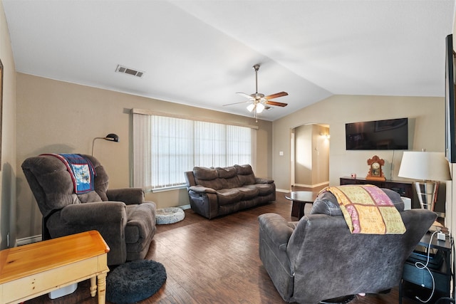 living area featuring visible vents, ceiling fan, wood finished floors, arched walkways, and lofted ceiling