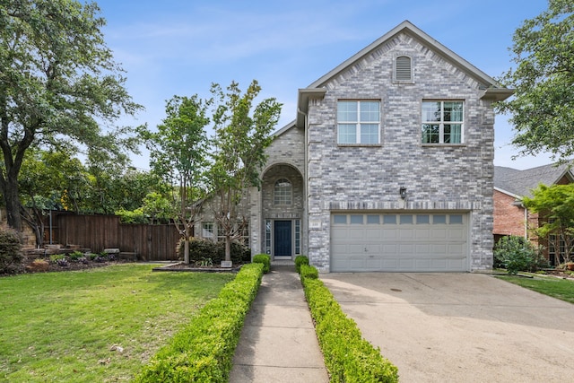 359 Kahala Dr, Dallas, TX 75218 - traditional-style house featuring fence, a front lawn, brick siding, an attached garage, and concrete driveway
