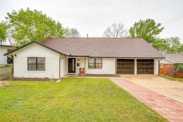 3113 Westfield Ave, Fort Worth, TX 76133 - view of front of house with brick siding, a front yard, driveway, and a garage
