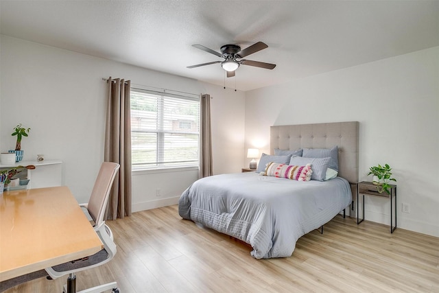 3113 Westfield Ave, Fort Worth, TX 76133 - bedroom featuring baseboards, ceiling fan, and light wood-style flooring