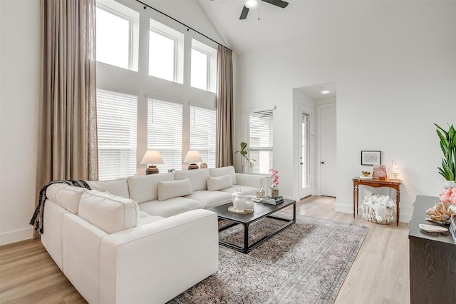1512 Trailblazer Way, Northlake, TX 76247 - living area featuring ceiling fan, high vaulted ceiling, baseboards, and light wood finished floors