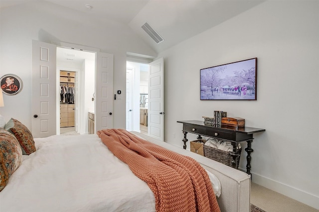 1512 Trailblazer Way, Northlake, TX 76247 - carpeted bedroom featuring lofted ceiling, connected bathroom, and baseboards