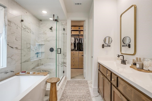 1512 Trailblazer Way, Northlake, TX 76247 - full bath with a shower stall, a tub to relax in, double vanity, a spacious closet, and marble look tile flooring