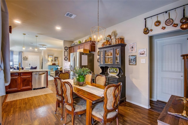 4036 Eagle Dr, Forney, TX 75126 - dining space with baseboards, visible vents, dark wood-type flooring, and an inviting chandelier