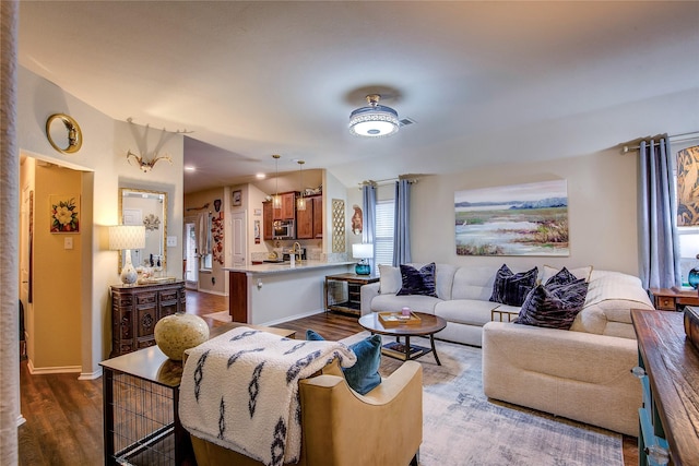 4036 Eagle Dr, Forney, TX 75126 - living room featuring dark wood-style floors and baseboards