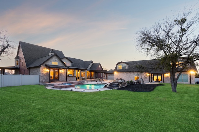 401 Willowcrest, Rockwall, TX 75032 - exterior space featuring a lawn, an in ground hot tub, fence, and a fenced in pool
