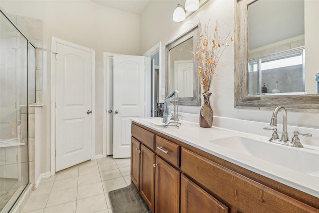 7203 Veal Station Rd, Weatherford, TX 76085 - bathroom featuring tile patterned floors, a sink, a stall shower, and double vanity
