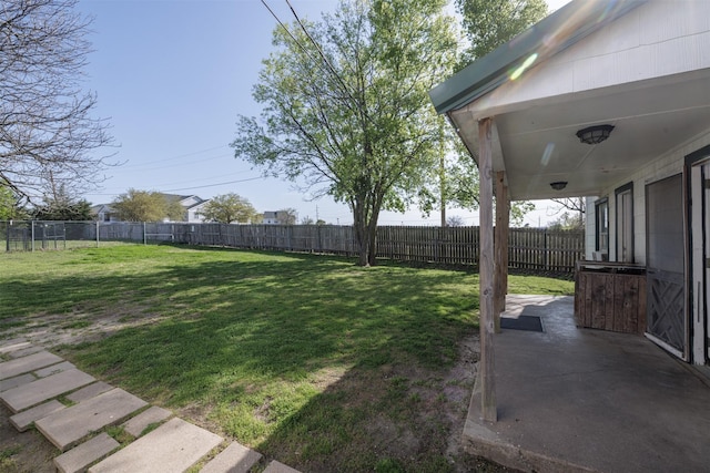 view of yard with a fenced backyard and a patio