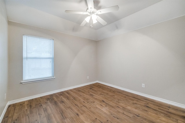 9212 Water Oak Dr, Arlington, TX 76002 - unfurnished room featuring wood finished floors, baseboards, ceiling fan, and lofted ceiling