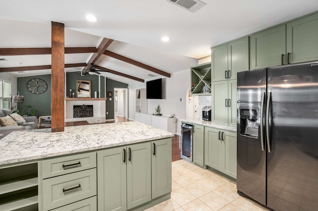 1417 Northridge Dr, Carrollton, TX 75006 - kitchen with visible vents, open shelves, black refrigerator with ice dispenser, ceiling fan, and green cabinets