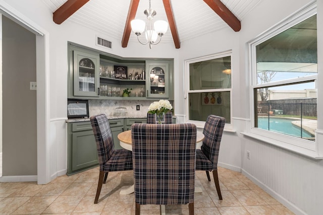 1417 Northridge Dr, Carrollton, TX 75006 - dining room with light tile patterned floors, beamed ceiling, a notable chandelier, and visible vents