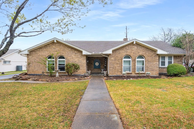 1417 Northridge Dr, Carrollton, TX 75006 - ranch-style house with brick siding, a front lawn, roof with shingles, and a chimney