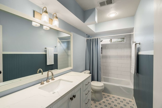 1417 Northridge Dr, Carrollton, TX 75006 - bathroom featuring vanity, toilet, tile patterned floors, shower / bath combination with curtain, and visible vents