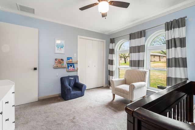 1417 Northridge Dr, Carrollton, TX 75006 - bedroom featuring visible vents, a ceiling fan, a closet, ornamental molding, and carpet flooring