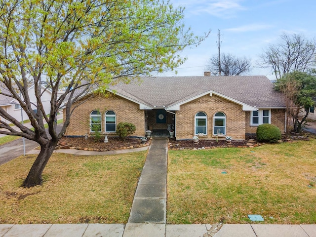1417 Northridge Dr, Carrollton, TX 75006 - ranch-style home featuring brick siding, roof with shingles, and a front lawn