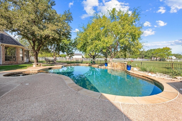 view of pool with a fenced backyard, a fenced in pool, and a patio area