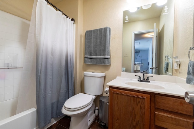 bathroom featuring shower / bathtub combination with curtain, toilet, tile patterned floors, and vanity