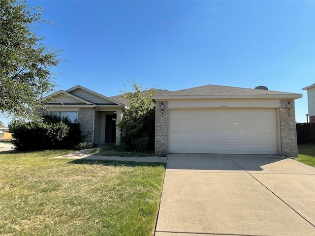 ranch-style home featuring driveway, an attached garage, a front lawn, and brick siding