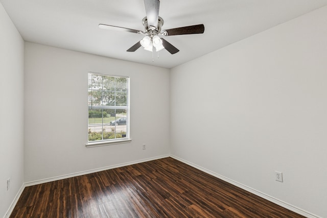 1416 Eagles Nest Trl, Krum, TX 76249 - spare room with dark wood-style flooring, baseboards, and ceiling fan
