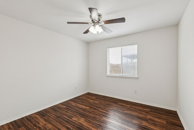 1416 Eagles Nest Trl, Krum, TX 76249 - empty room with dark wood-style flooring, baseboards, and a ceiling fan