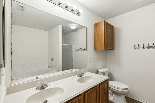 1416 Eagles Nest Trl, Krum, TX 76249 - full bath featuring a shower with shower door, toilet, a bath, and double vanity
