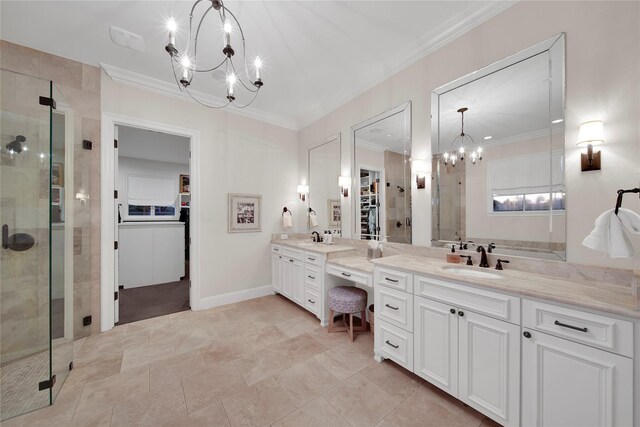 bathroom featuring an inviting chandelier, crown molding, a spacious closet, and a shower stall