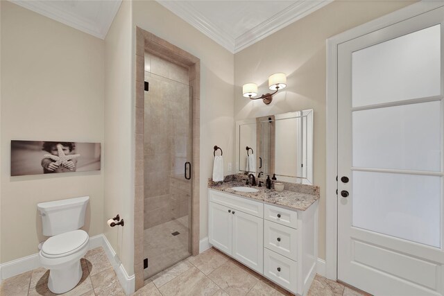 full bathroom with vanity, toilet, baseboards, ornamental molding, and a stall shower