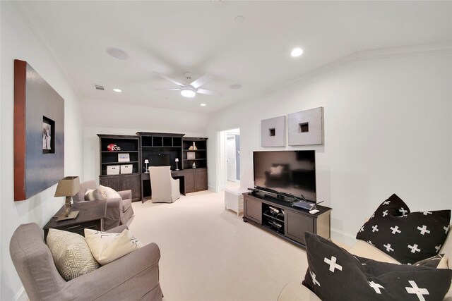 living area featuring crown molding, light carpet, baseboards, ceiling fan, and recessed lighting