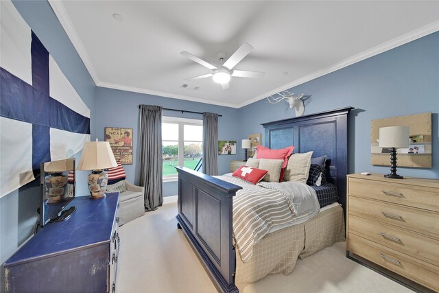 bedroom featuring crown molding, ceiling fan, and visible vents