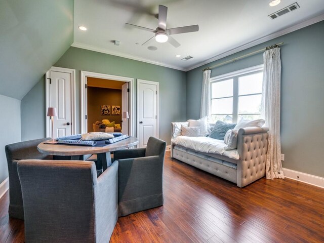 living room featuring a ceiling fan, baseboards, visible vents, and wood finished floors