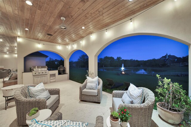 view of patio / terrace featuring grilling area and an outdoor kitchen