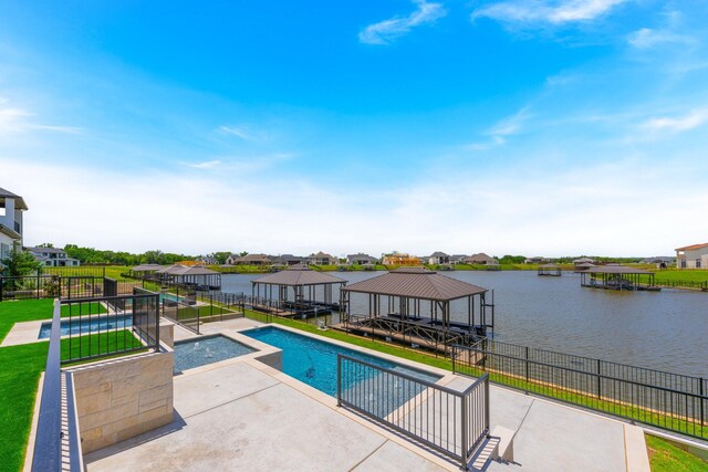12479 Palmer Dr, Fort Worth, TX 76179 - view of swimming pool with a water view, a dock, boat lift, a gazebo, and a residential view