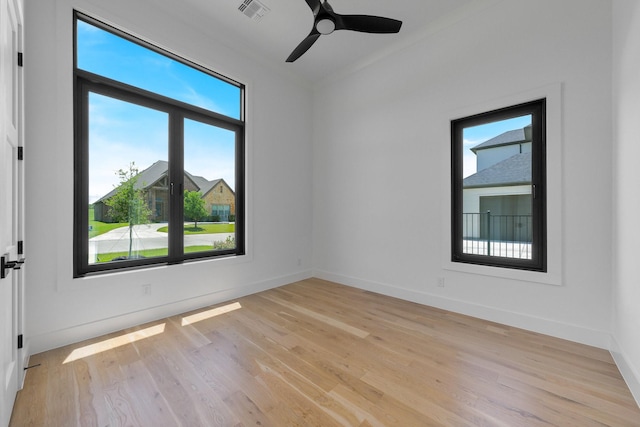12479 Palmer Dr, Fort Worth, TX 76179 - unfurnished room featuring plenty of natural light, light wood finished floors, and a ceiling fan