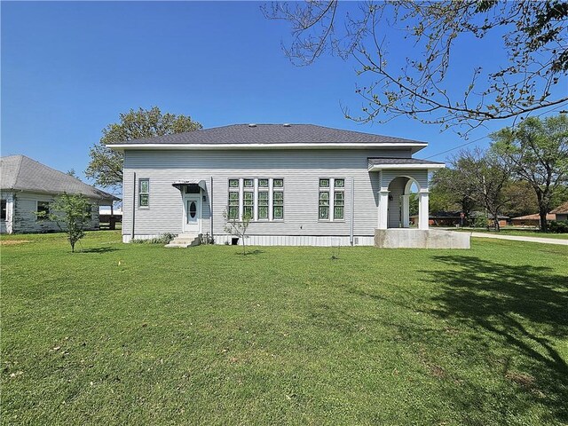 1100 Tyler St, Thornton, TX 76687 - rear view of house featuring a yard and entry steps